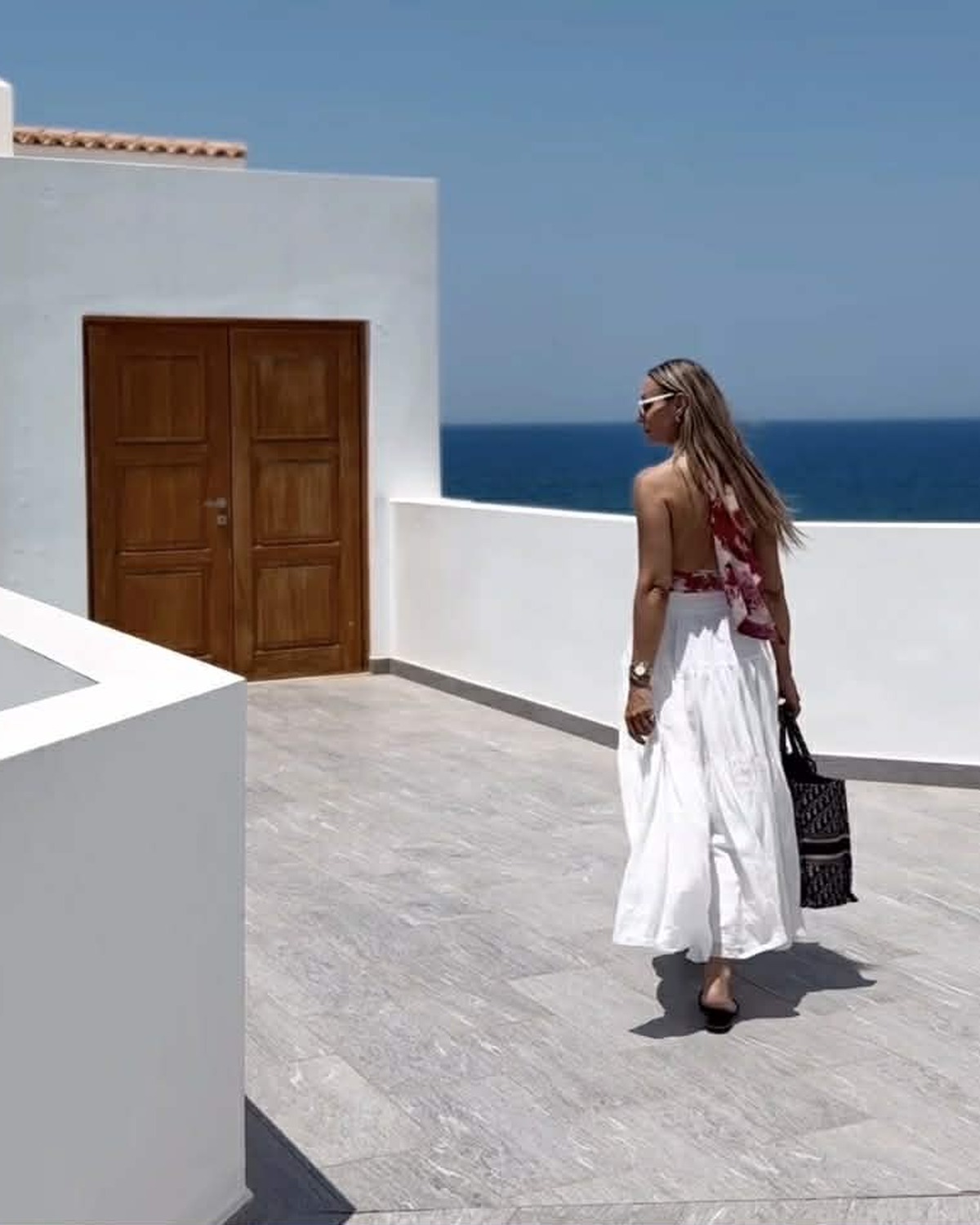 Balcony lifestyle portrait in a premium suite or villa